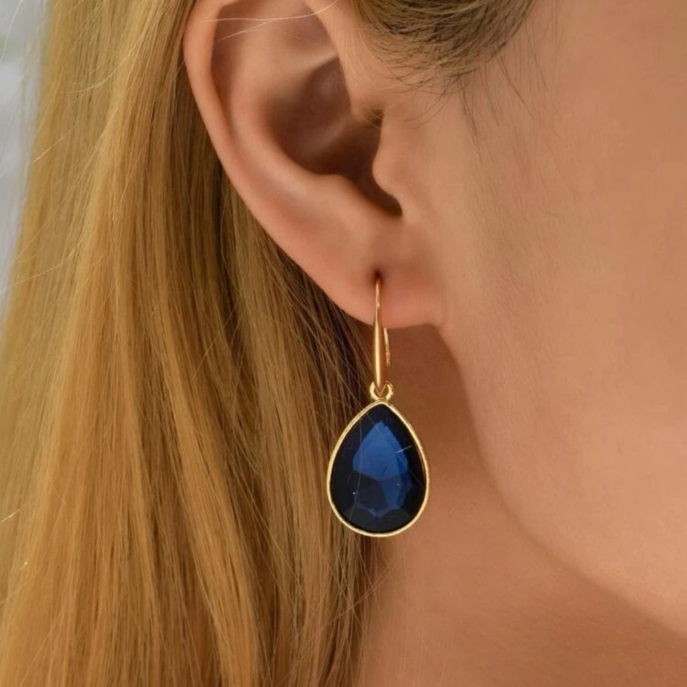 Blue and gold drop earrings.